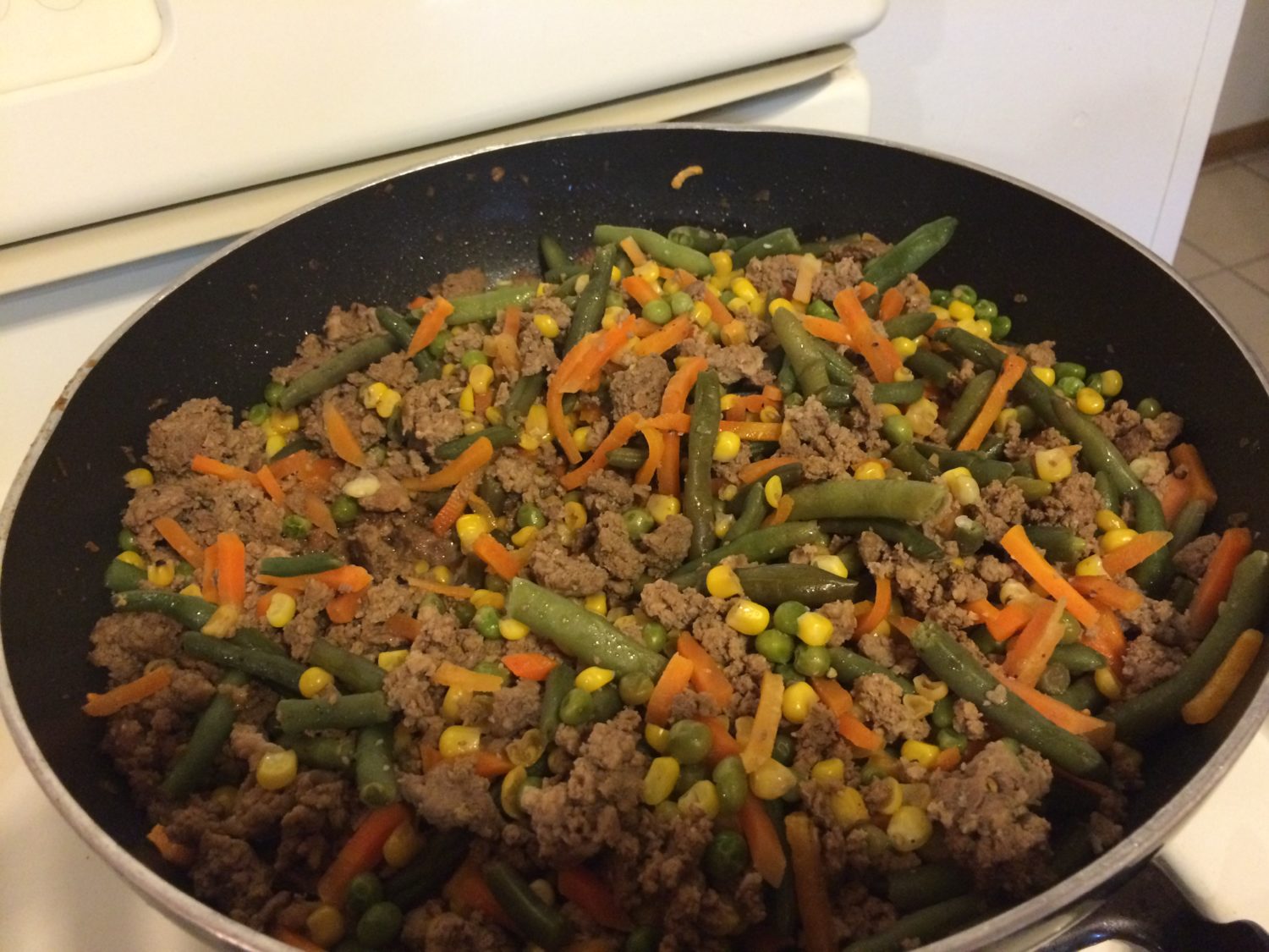 First, I cook the filling in a huge wok. I love my nonstick wok.